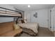Cozy bedroom featuring a bunk bed with sleeping space for three and neutral tones at 7341 Bimini Dr, Port Richey, FL 34668