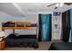 Bedroom featuring a bunk bed, ceiling fan, and natural light at 7341 Bimini Dr, Port Richey, FL 34668