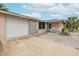 Charming single-story home featuring a one-car garage, covered front porch, and well-maintained landscaping at 7341 Bimini Dr, Port Richey, FL 34668