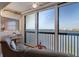 Relaxing balcony featuring beautiful waterfront views and comfortable seating at 8211 Brent St # 837, Port Richey, FL 34668