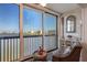 Serene balcony showcasing stunning waterfront views and seating area at 8211 Brent St # 837, Port Richey, FL 34668