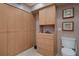 Bathroom features custom built in storage and a modern toilet at 8211 Brent St # 837, Port Richey, FL 34668
