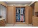 Walk-in closet with custom organizers and spacious storage at 8211 Brent St # 837, Port Richey, FL 34668