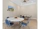 This game room has tables and seats for card or board games, as well as for socializing with other condo owners at 8211 Brent St # 837, Port Richey, FL 34668