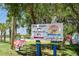 A sign that says 'You Hook 'em, We Cook 'em' for Seanyle Cove, offering fresh seafood cuisine at 8211 Brent St # 837, Port Richey, FL 34668