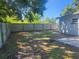 Backyard with privacy fence and ample space at 825 Lincoln Ave, Tarpon Springs, FL 34689