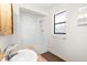 Bright bathroom features tile floors, an enclosed shower and modern fixtures at 8466 Eldridge Rd, Spring Hill, FL 34608