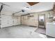 Wide garage with laundry area with plenty of space for parking at 8466 Eldridge Rd, Spring Hill, FL 34608