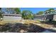Spacious backyard featuring a shed and ample room for outdoor activities, creating a versatile area at 9625 Pat St, Hudson, FL 34669