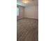 Inviting bedroom with wood-look floors and natural light from the window at 9625 Pat St, Hudson, FL 34669