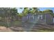 Inviting single-story home with manicured lawn and an asphalt driveway leading to the front at 9625 Pat St, Hudson, FL 34669