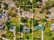A large parcel is bounded by a white outline and features a pool and landscaping behind the main house at 10318 Piper Dr, New Port Richey, FL 34654