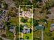 A large parcel is bounded by a white outline and features a pool and landscaping behind the main house at 10318 Piper Dr, New Port Richey, FL 34654