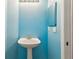 Bathroom with sink and brass fixtures at 10318 Piper Dr, New Port Richey, FL 34654
