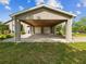 Spacious two-car carport provides sheltered parking with concrete floor and convenient access to the home at 10318 Piper Dr, New Port Richey, FL 34654