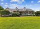 Charming single-story home with a well-manicured front lawn and inviting curb appeal at 10318 Piper Dr, New Port Richey, FL 34654