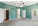 Spacious main bedroom with attached bathroom and large walk-in closet at 10318 Piper Dr, New Port Richey, FL 34654