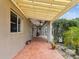 Spacious covered patio with ceiling fans, offering a relaxing outdoor living space at 10318 Piper Dr, New Port Richey, FL 34654