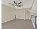 Bonus Room with high ceilings and wood-look floors at 10423 Ashley Oaks Dr, Riverview, FL 33578