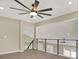 Bonus Room with high ceilings and a ceiling fan at 10423 Ashley Oaks Dr, Riverview, FL 33578