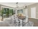 Elegant dining room with large window and stylish decor at 10423 Ashley Oaks Dr, Riverview, FL 33578