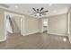 Room featuring open design, stairs, and bright lighting at 10423 Ashley Oaks Dr, Riverview, FL 33578