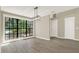 Bright room with large windows and modern lighting at 10423 Ashley Oaks Dr, Riverview, FL 33578