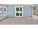 Enclosed sunroom with tile flooring and backyard access at 10423 Ashley Oaks Dr, Riverview, FL 33578
