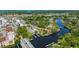 Aerial view of a bridge over a waterway with marinas, town, and local businesses in view at 10531 Lakeview Dr, New Port Richey, FL 34654