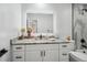 Modern bathroom featuring granite countertops, updated fixtures, and stylish vanity lighting for a clean aesthetic at 10531 Lakeview Dr, New Port Richey, FL 34654