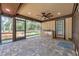 Covered patio with a sink area, brick pavers, and views of the backyard at 10531 Lakeview Dr, New Port Richey, FL 34654