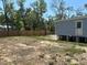 Large lot featuring a newly installed wooden fence at 11444 Lake Dr, New Port Richey, FL 34654