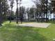 Outdoor park featuring a basketball court, picnic tables and playground equipment at 11444 Lake Dr, New Port Richey, FL 34654