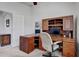 Functional home office with a built-in desk, offering a comfortable and productive workspace at 12004 Valley Falls Loop, Spring Hill, FL 34609