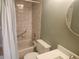 Bathroom featuring a tub/shower combination, toilet and vanity at 12119 Sunny Glen Ln # G2, Hudson, FL 34669