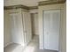Closet with bi-fold doors and tile flooring at 12119 Sunny Glen Ln # G2, Hudson, FL 34669