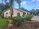 Exterior view of property with access to community pool at 12119 Sunny Glen Ln # G2, Hudson, FL 34669