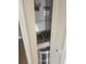Utility closet with HVAC, filter, and water heater at 12119 Sunny Glen Ln # G2, Hudson, FL 34669