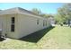 Exterior shot showing the side and back of the house at 12714 Saulston Pl, Hudson, FL 34669