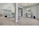 Open-concept living room with modern finishes and plenty of space for entertaining at 12848 Hilary St, Spring Hill, FL 34609