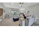 Inviting living room with neutral walls, recessed lighting, and plenty of seating at 12848 Hilary St, Spring Hill, FL 34609