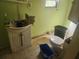 Unmaintained bathroom featuring outdated sink, toilet and grimy tile flooring at 13120 Davista Ave, New Port Richey, FL 34654