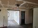 A view of a room under renovation showing access to another room at 13120 Davista Ave, New Port Richey, FL 34654