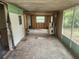 View of a room under renovation with a hot water heater and open ceiling at 13120 Davista Ave, New Port Richey, FL 34654