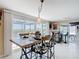 Dining area connecting to outdoor living with water views at 13415 Starfish Dr, Hudson, FL 34667