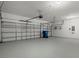 Spacious two-car garage with an automatic door and ample room for parking at 13619 Hunters Point St, Spring Hill, FL 34609