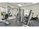Community gym includes multiple weight machines, treadmills, and exercise bikes for residents to use at 13619 Hunters Point St, Spring Hill, FL 34609