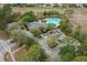 Overhead view of the neighborhood pool and clubhouse with parking at 13619 Hunters Point St, Spring Hill, FL 34609