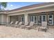 Inviting poolside area with comfortable lounge chairs and convenient access to the clubhouse at 13619 Hunters Point St, Spring Hill, FL 34609