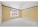 Spacious bedroom featuring a large window and a built-in window nook, great for relaxing at 1473 Sail Harbor Cir, Tarpon Springs, FL 34689